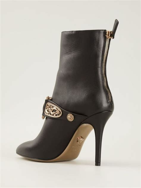 versace medusa face|Versace Medusa boots.